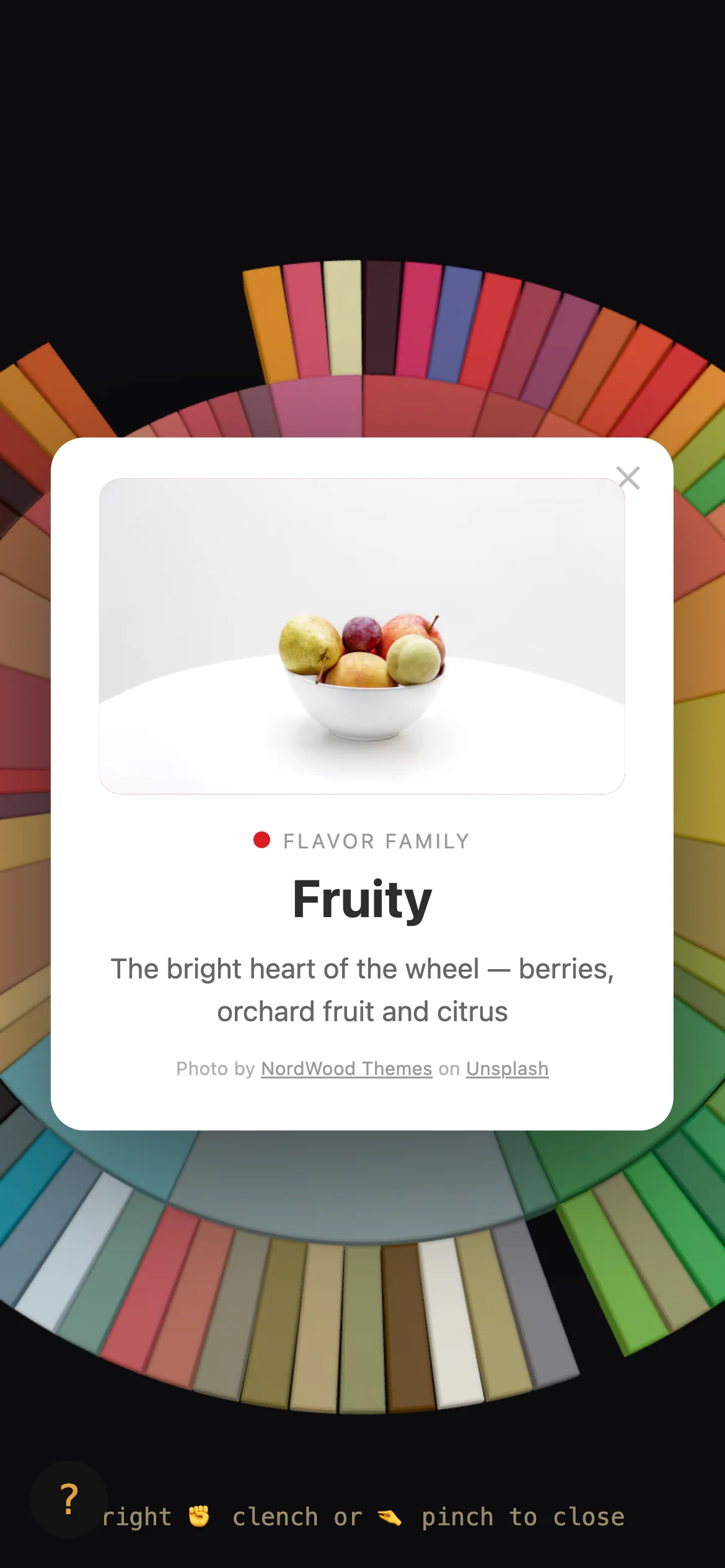 A flavour card open over the wheel on a phone